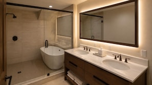 A modern bathroom with a glass-enclosed shower, two sinks, and a large mirror. - Modern Luxury 4 Bedroom/4 Bathroom Cabin w/ AC + Free Access to Waterpark (Gatlinburg)