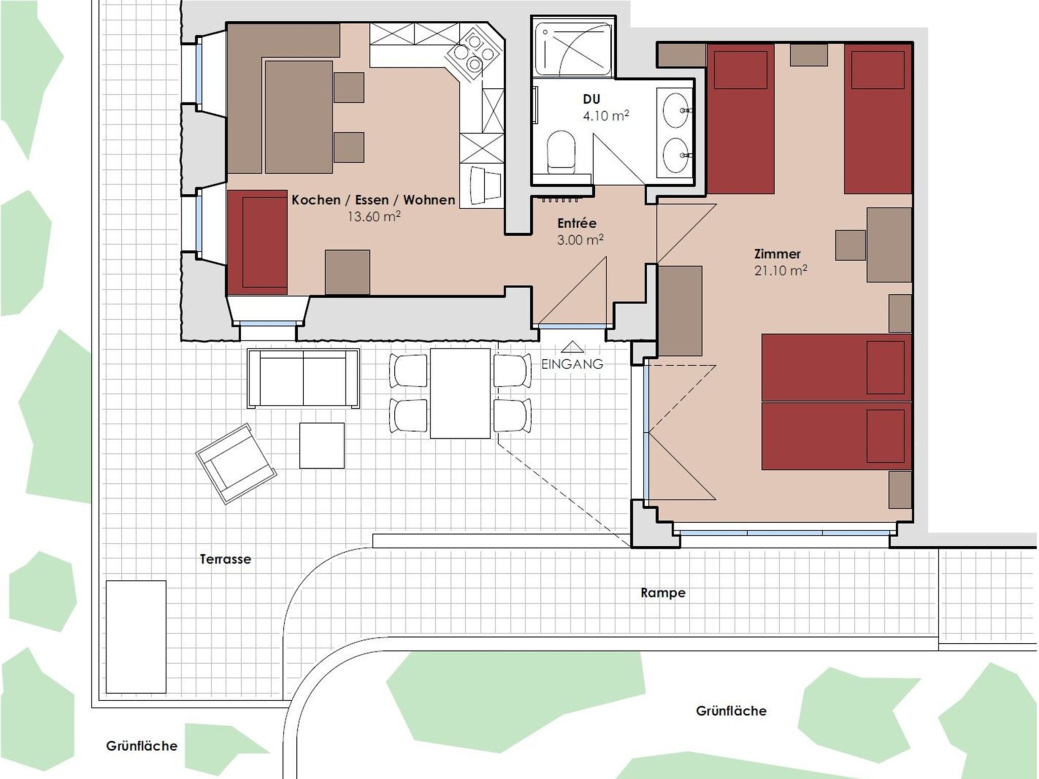 Plano de planta que muestra una cocina, comedor y dos dormitorios.