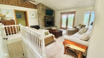 Smart TV, fireplace, foosball, books