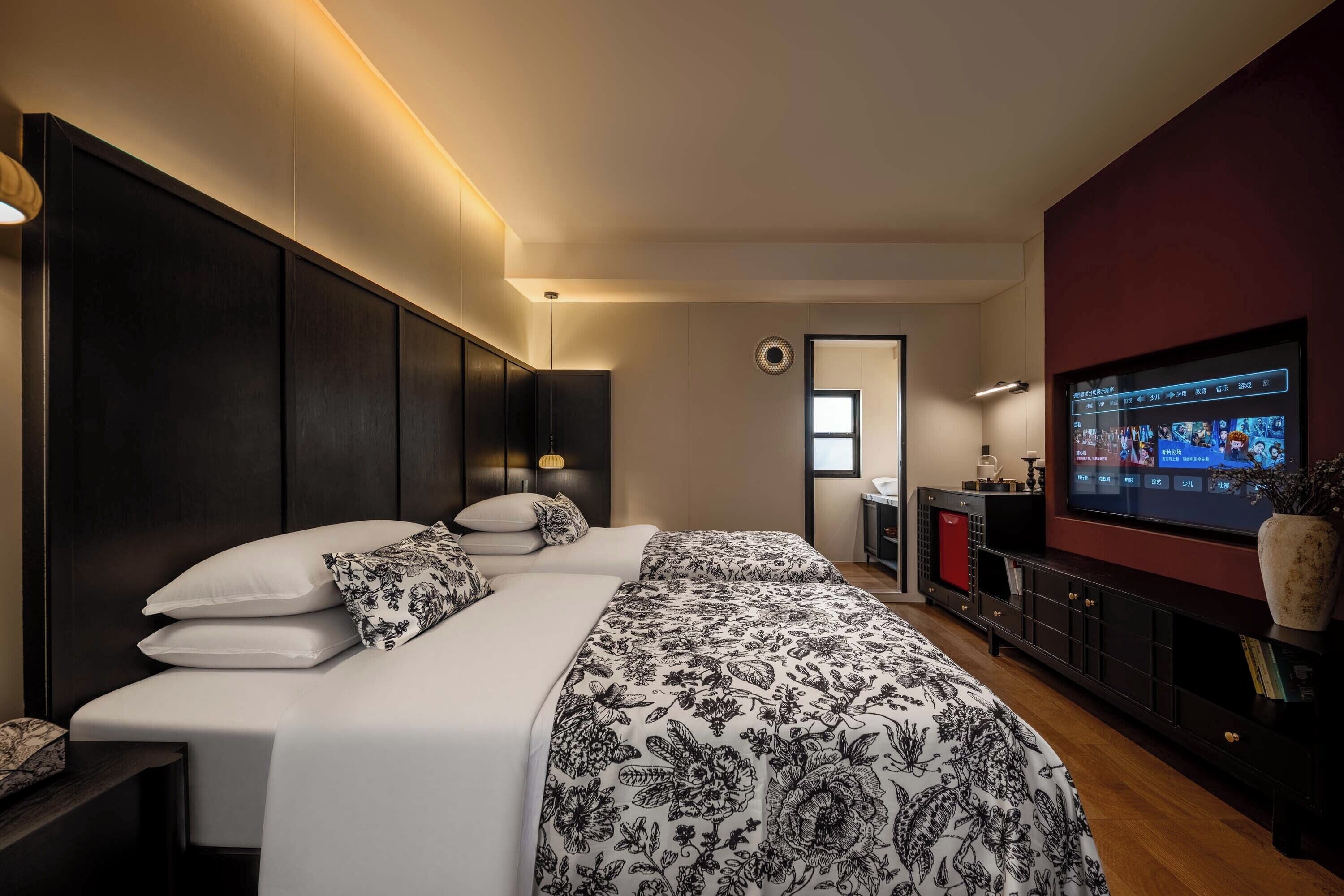 Kamar Twin Senior, pemandangan kebun | Seprai premium, minibar, dan didekorasi berbeda-beda