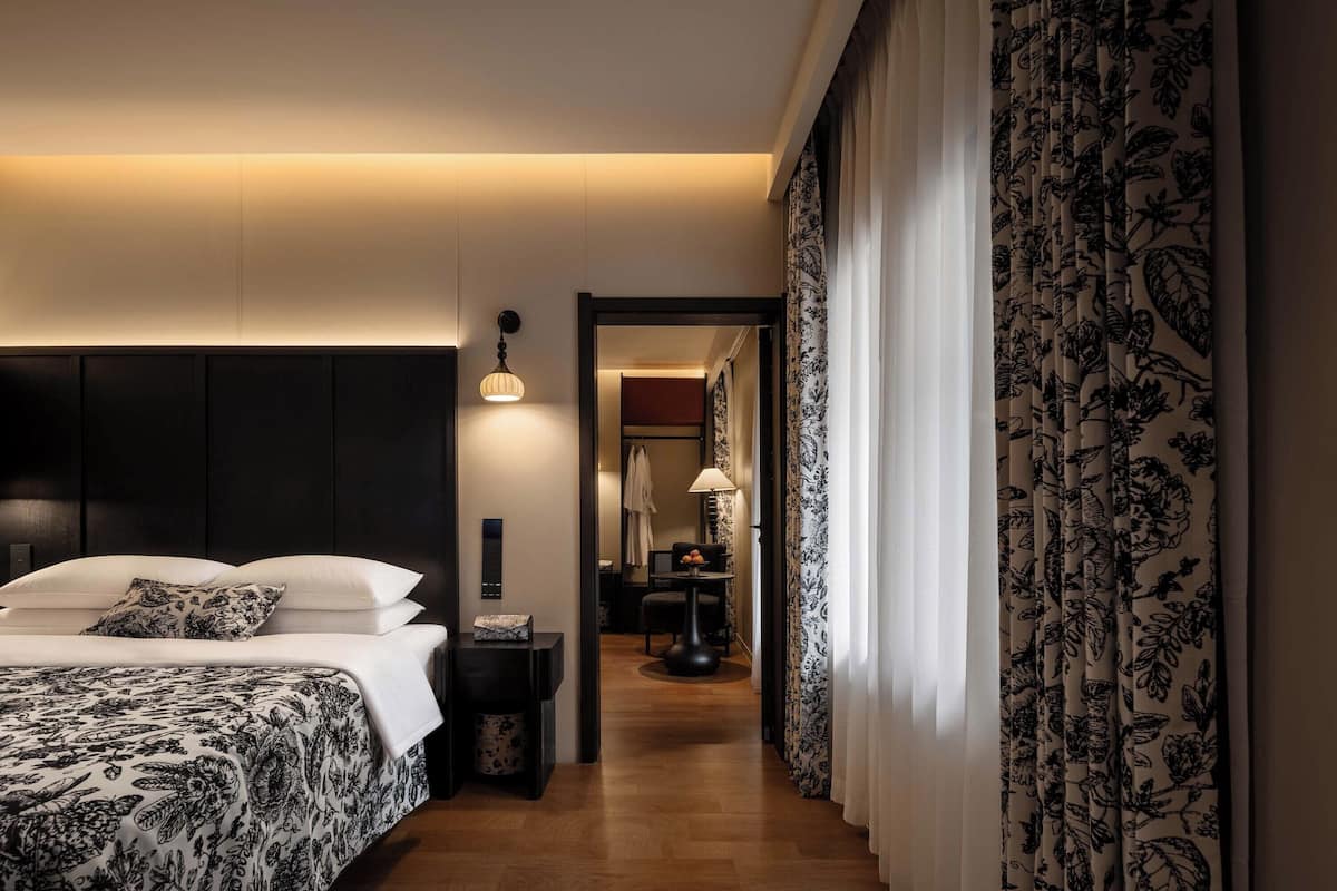 Elite Suite | Premium bedding, minibar, blackout drapes, soundproofing