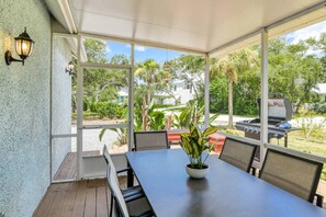 Outdoor dining - Short Walk to the Beach, Screened Porch, Renovated Home, 4 miles to Downtown, $300 in Free Tickets! (St. Augustine)