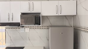 Apartamento, 4 quartos, acessível | Cozinha privada
