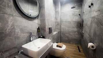 Shower, slippers, towels, soap