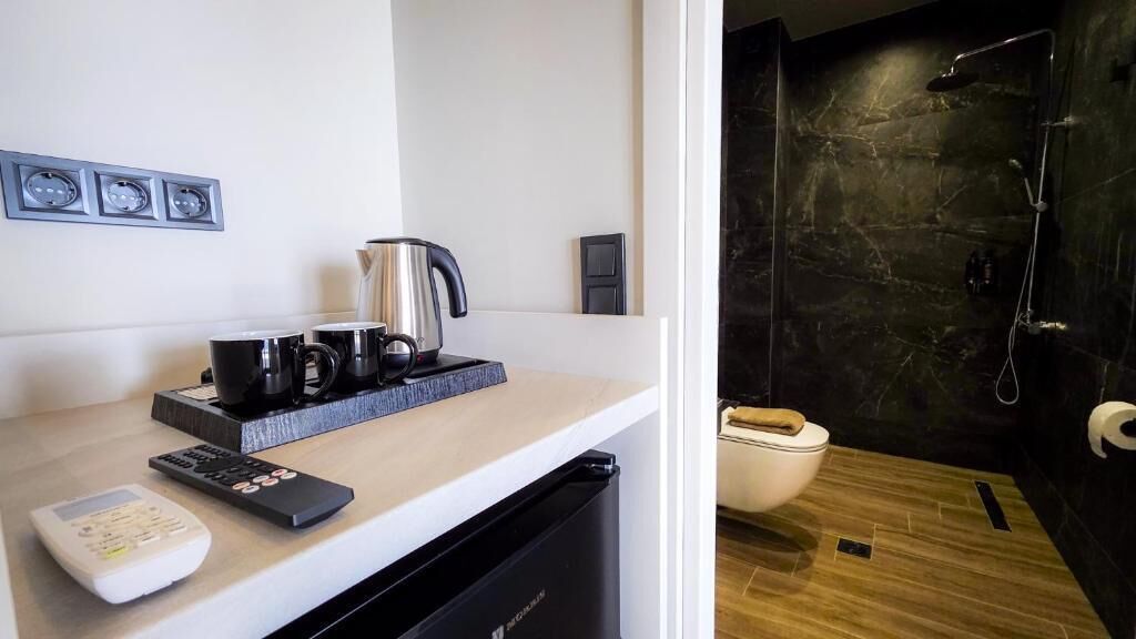 Shower, slippers, towels, soap