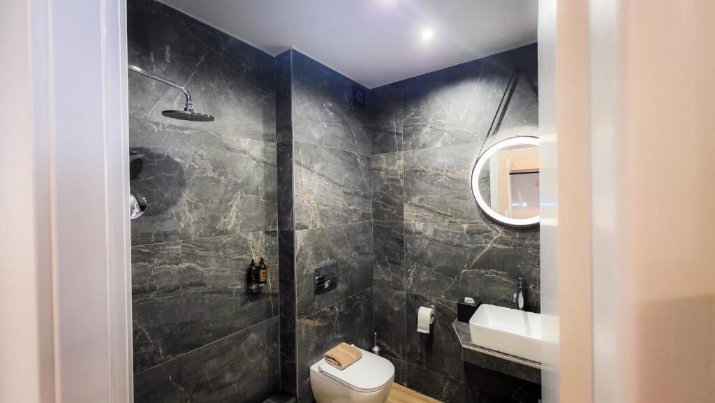 Shower, slippers, towels, soap