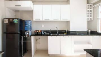 Departamento, balcón, vista a la ciudad | Cocina privada