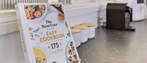 A promotional display for 'The BestEver EASY COOKBOOK' featuring 175 winning recipes.