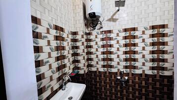 Shower, bidet, towels, soap