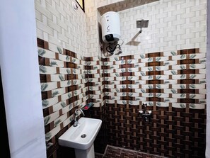 Shower, bidet, towels, soap