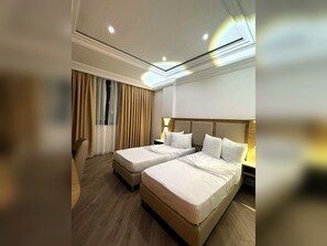 Doppel- oder Zweibettzimmer | Zimmersafe, Bügeleisen/Bügelbrett, kostenloses WLAN