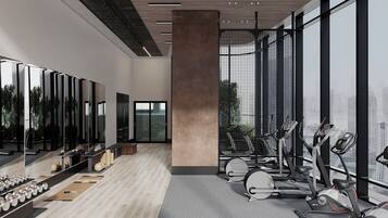 A modern gym with exercise equipment, large windows, and a city view.