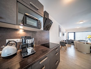 Fridge, microwave, cookware/dishes/utensils