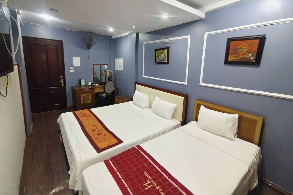 Quarto triplo superior | Escrivaninha, Wi-Fi de cortesia