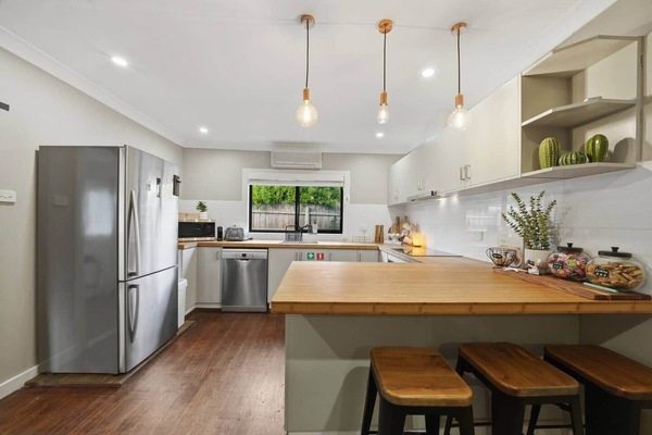 Prepare home-cooked meals in the fully equipped modern kitchen.