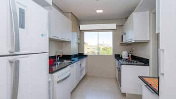Departamento, vista a la ciudad | Cocina privada