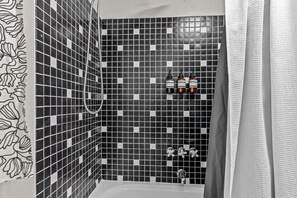 Jetted tub, hair dryer, towels, soap