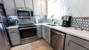Fridge, microwave, oven, stovetop - Beachside Dome Home with Spacious Outdoor Yard in South Padre Island, Texas (South Padre Island)