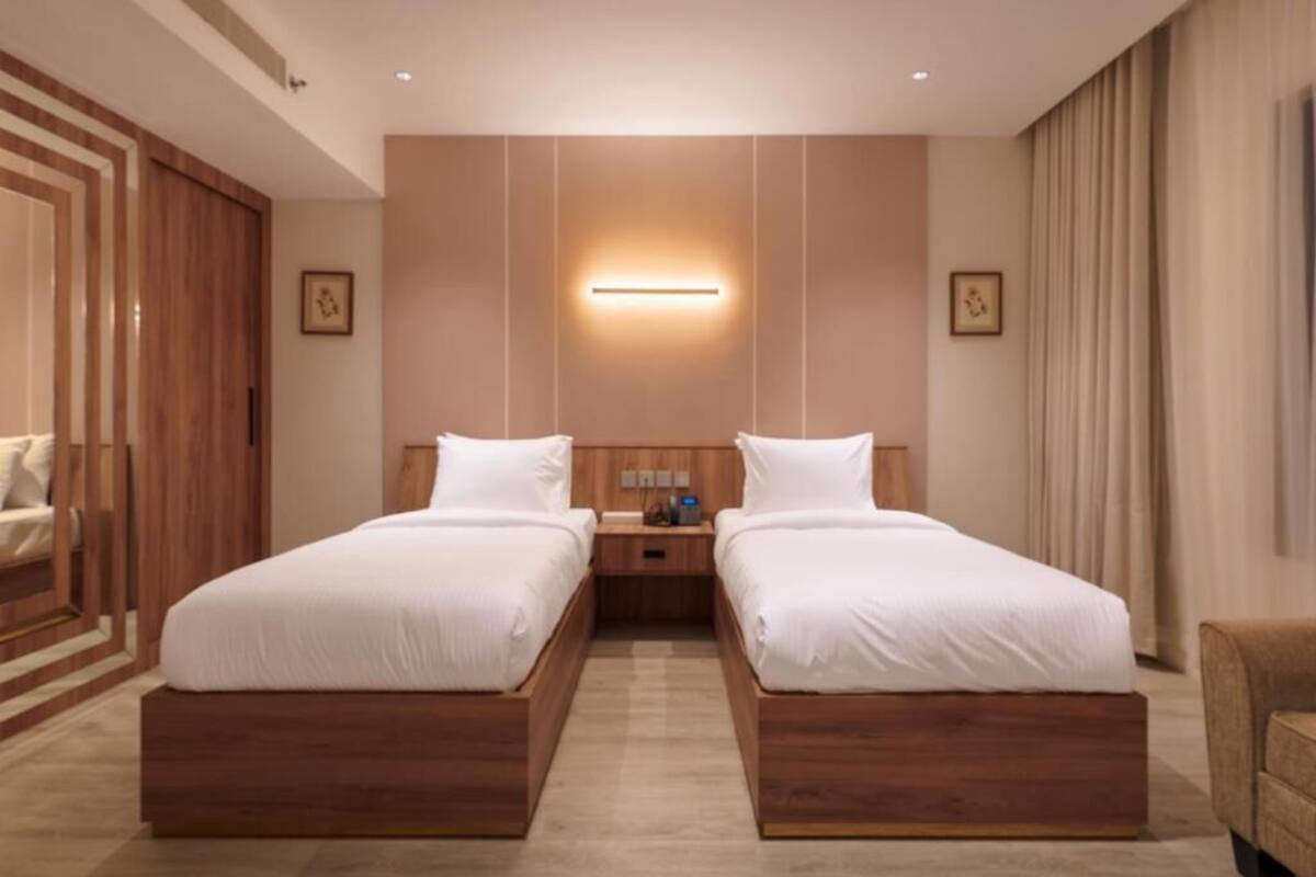 Deluxe Twin Room, City View | In-room safe, desk, iron/ironing board (on request), WiFi (free)