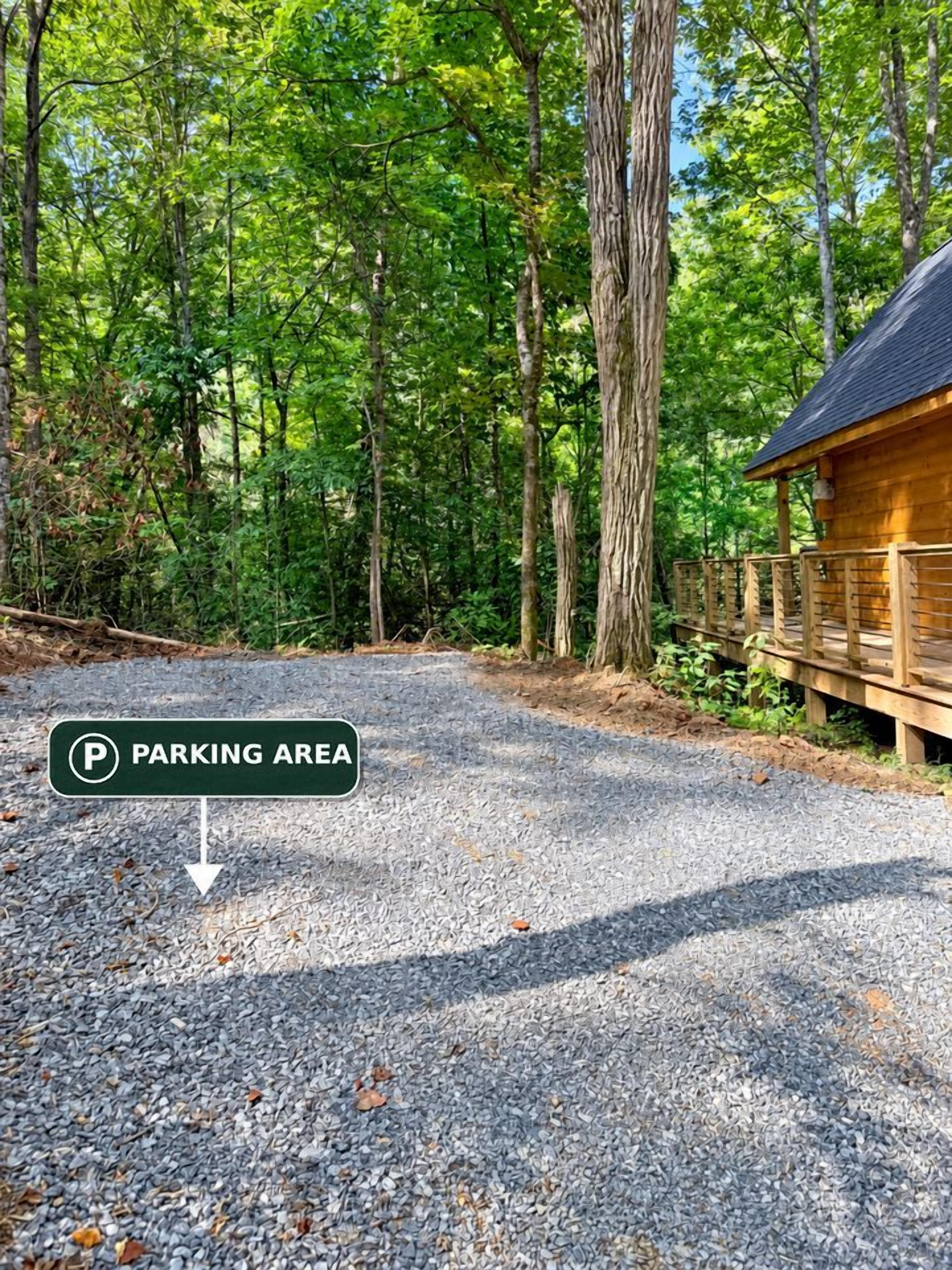 A gravel path leading to a wooden cabin with a sign indicating a parking area.