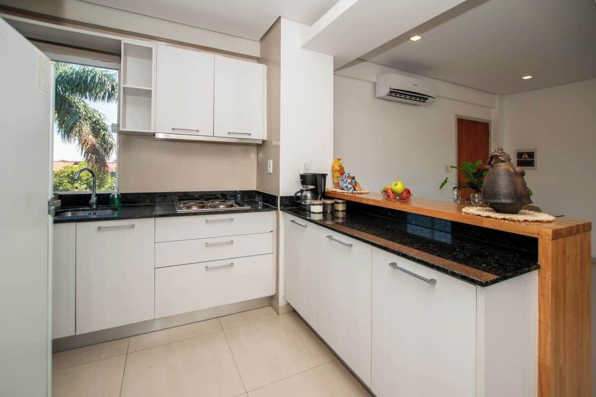 Apartamento, sacada, vista para a cidade | Cozinha privada
