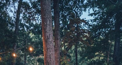 Outdoor Glamping Tent with Cozy Campfire Setup in Gainesville, Georgia