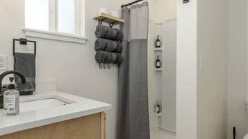 Hair dryer, towels, soap, shampoo