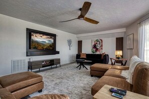 Living area - Spacious Smoky Mountain Cabin with RV Parking, Hot Tub & Game Room near Soaky Mountain Water Park in Sevierville, TN (Sevierville)