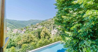 A very spacious villa in Rapallo, situated in the hills just a 10-minute drive from the sea. Spanning 270 sqm across 3 independent levels, the villa accommodates up to 16 guests, making it ideal for large groups or families. The outdoor area offers every