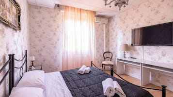 Iron/ironing board, travel crib, WiFi (free), bed sheets