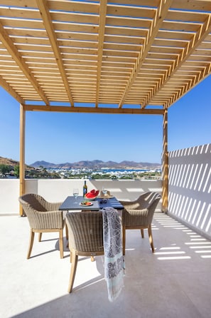 Departamento, baño privado, vista al mar | Restaurante al aire libre