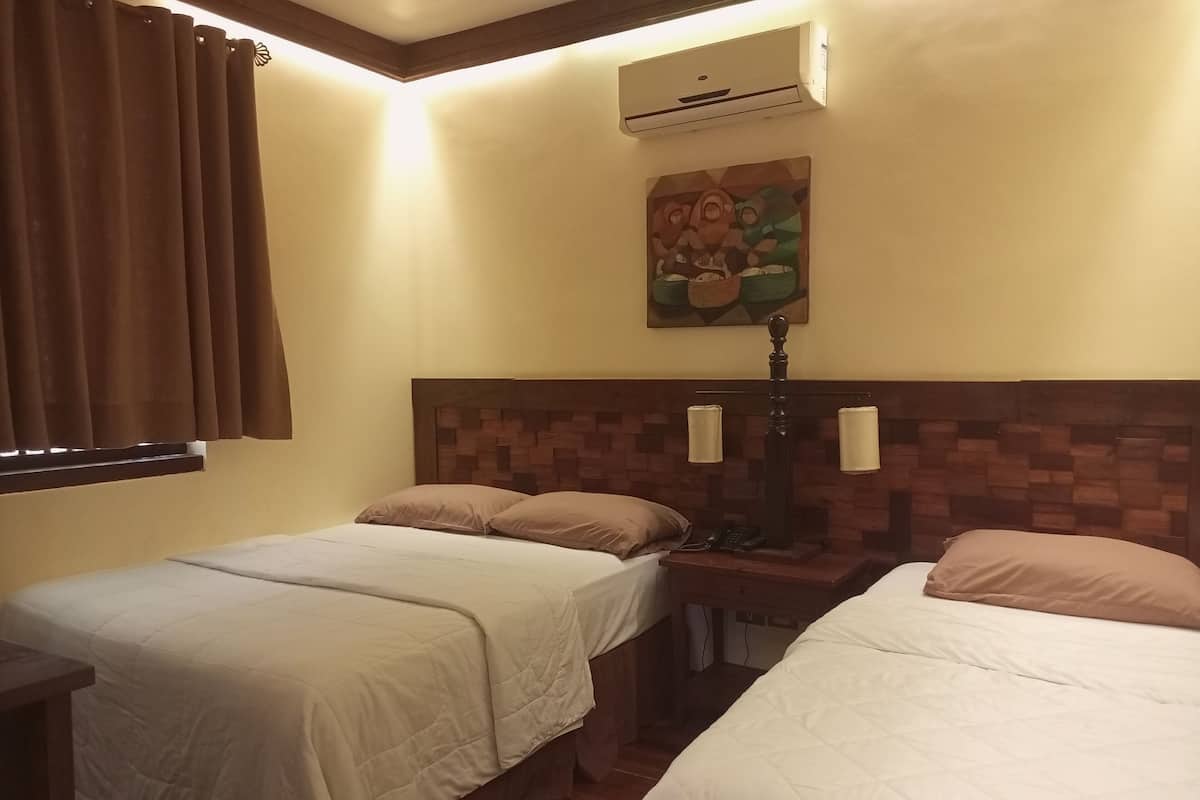 Chambre Triple Deluxe, patio | Bureau, espace de travail pour ordinateur portable, Wi-Fi gratuit