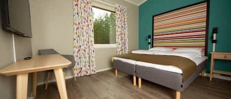 Habitación doble Confort, vista al jardín | Wifi gratis y ropa de cama