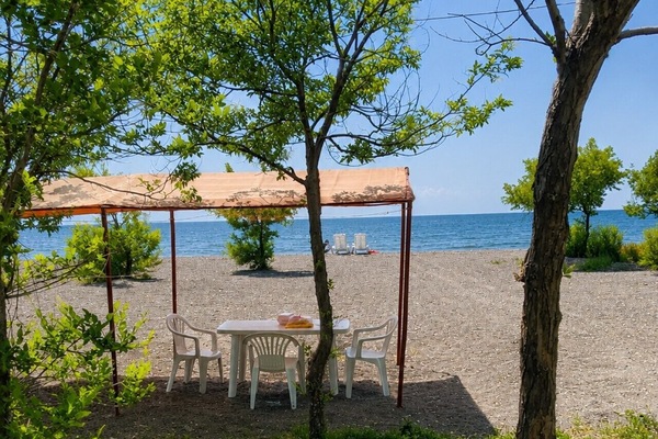 Outdoor dining area with a beautiful lake view