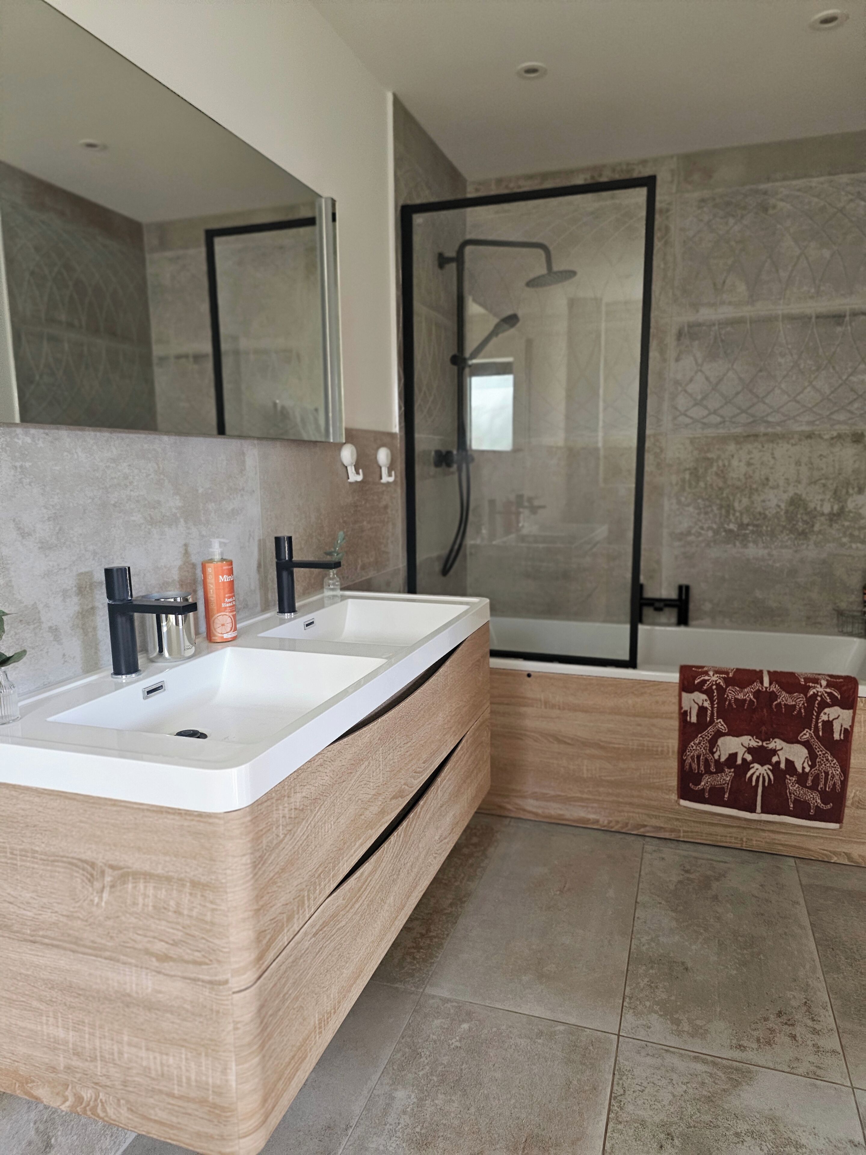 Combined shower/bathtub, deep-soaking bathtub, hair dryer, towels