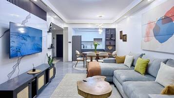 55-inch Smart TV with cable channels, Netflix, first-run films