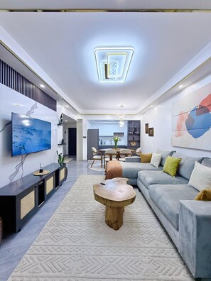 55-inch Smart TV with cable channels, Netflix, first-run movies - Capital Rise View Palace Apartment (Nairobi)