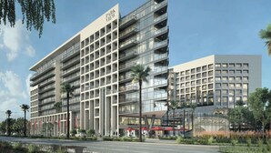 A modern hotel with multiple floors, large windows, and a prominent 'Park View' sign. - Bloomfields Studio in Park View   (Abu Dhabi)