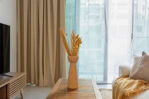 Apartamento, balcón | Zona de estar