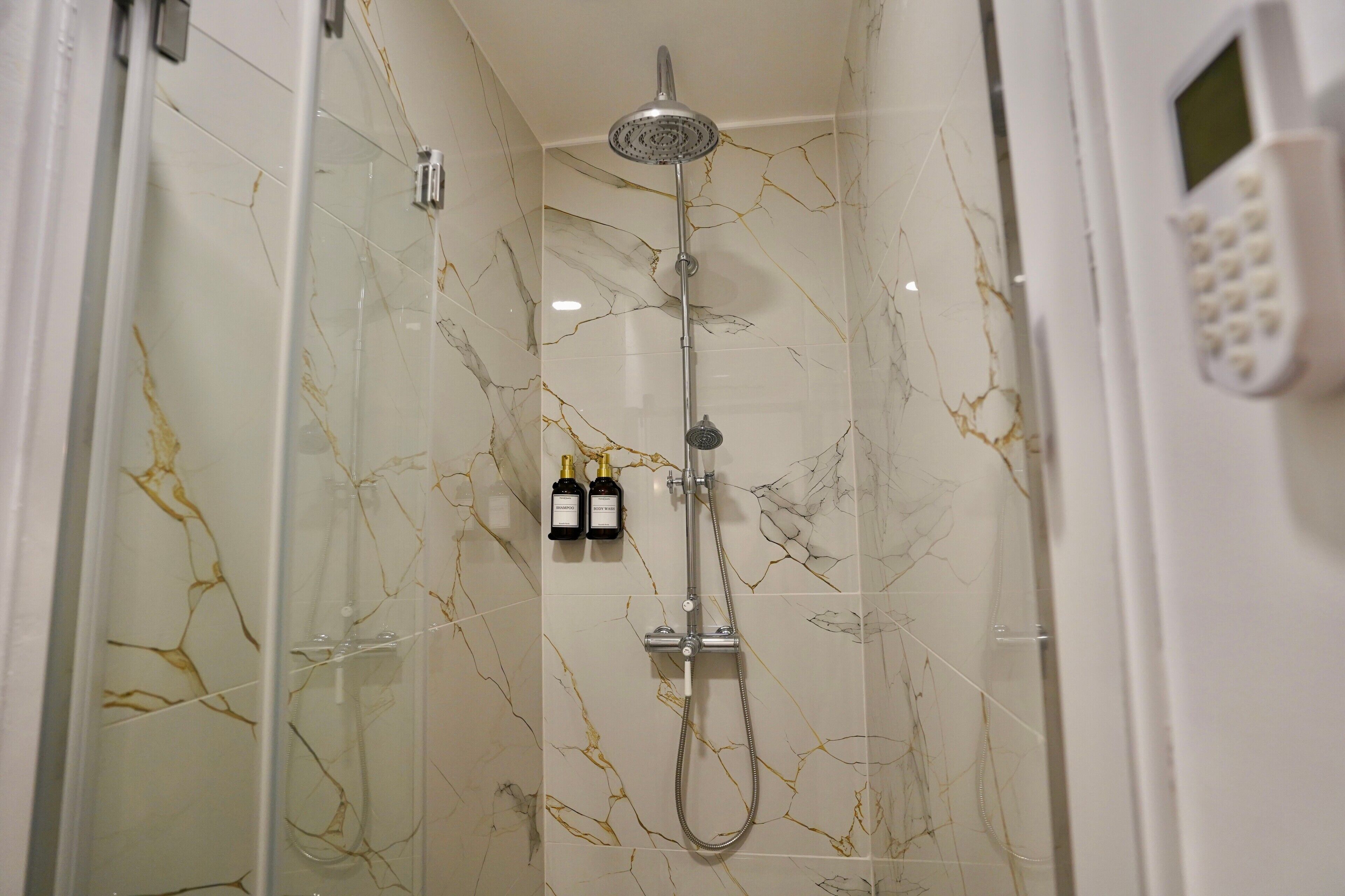 Shower, hair dryer, towels
