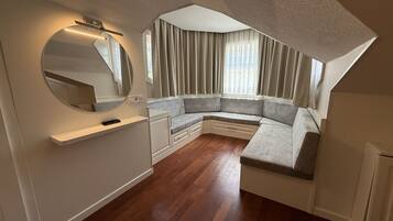 Triple room (1 large bed and one sofa bed), river view | Premium bedding, minibar, bed sheets