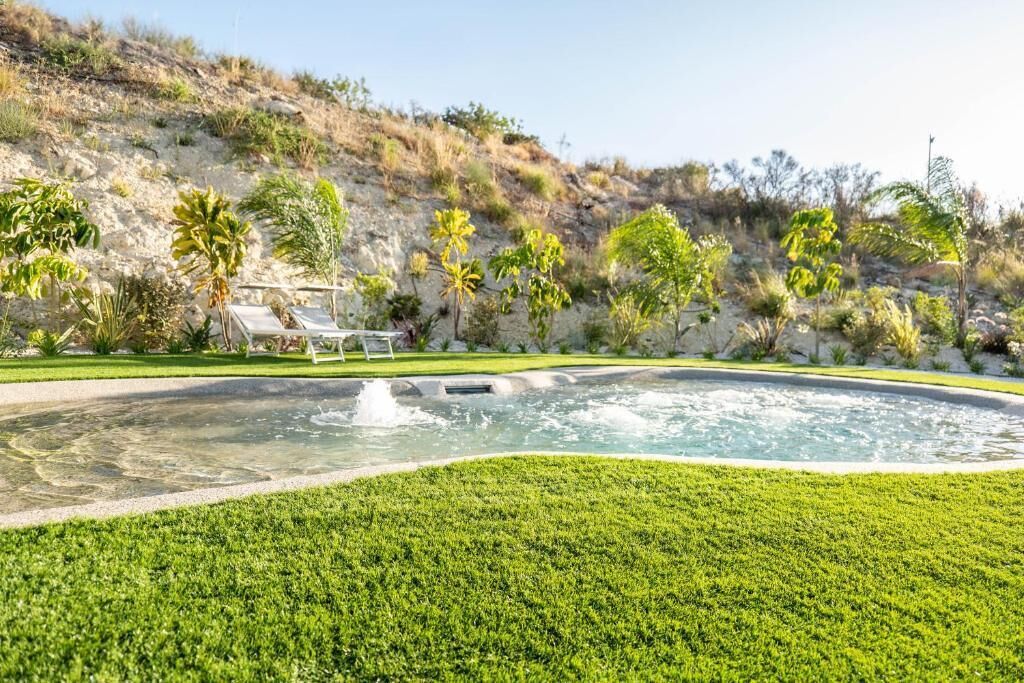 Seasonal outdoor pool, pool loungers