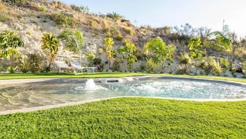 Seasonal outdoor pool, pool loungers