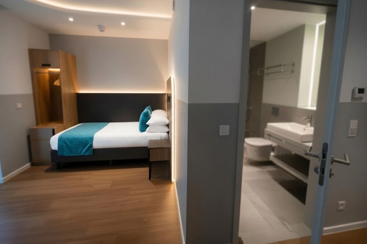 Habitación individual Deluxe, vista al río | Caja de seguridad en la habitación y escritorio 