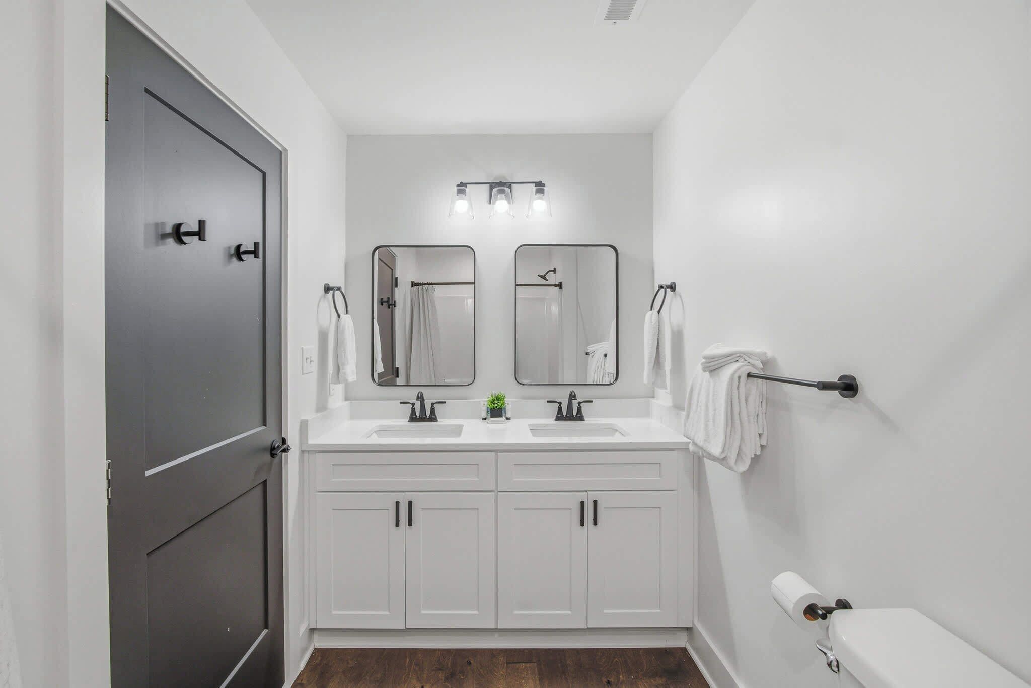 Shower, hair dryer, towels, shampoo