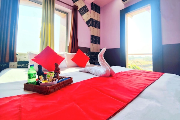 Deluxe Double Room, Balcony, Garden View | Laptop workspace, WiFi (free)