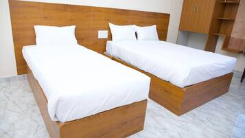 Superior Triple Room, Balcony, Courtyard View | Premium bedding, minibar, desk, laptop workspace