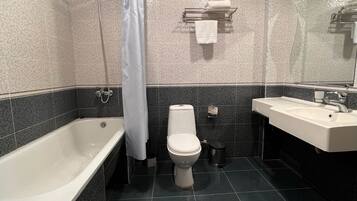 Hair dryer, slippers, towels, soap