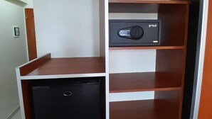A compact storage unit with shelves and a small compartment, likely for personal items. - Hotel Vitalia (Ushuaia)