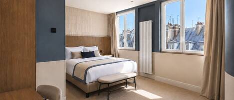 Habitación Deluxe, vista a la ciudad | Ropa de cama de alta calidad y caja de seguridad en la habitación